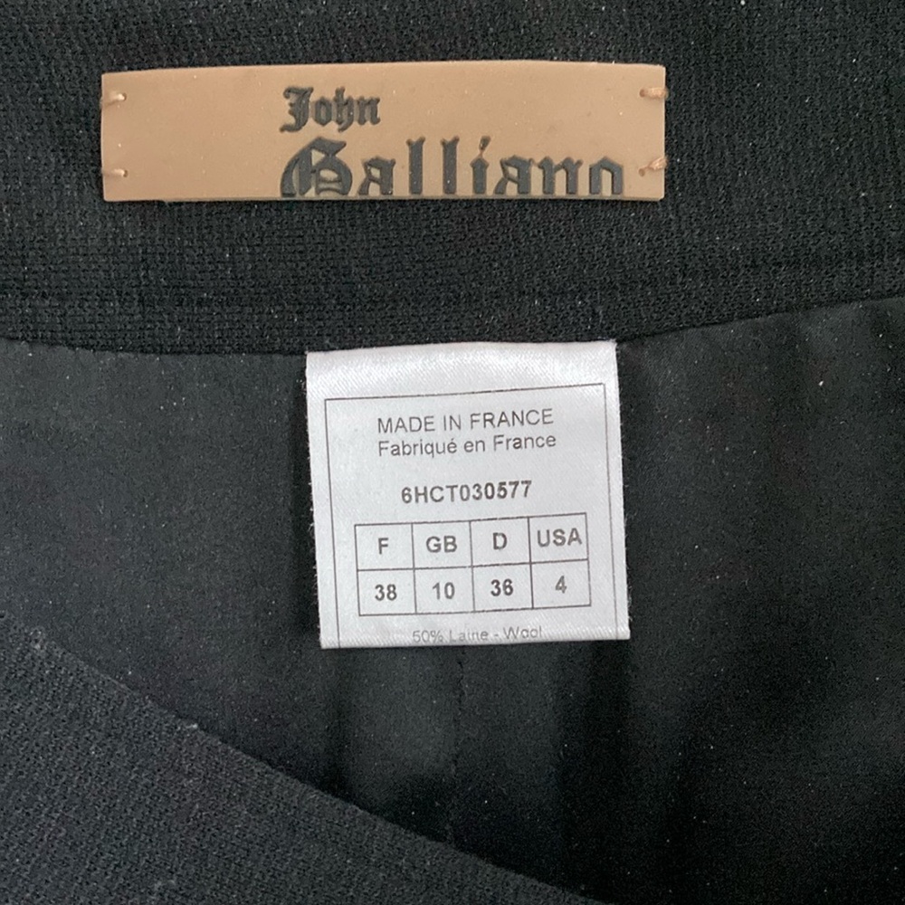 Women’s Black Wool Galliano Skirt. Form fitting. Elegant. New.